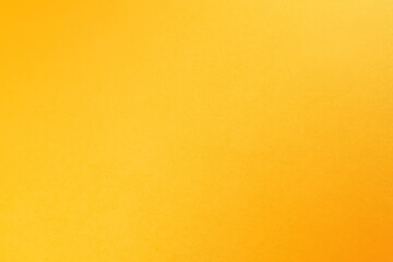 Bright fresh yellow orange tone color paint on environmental friendly cardboard box blank paper...