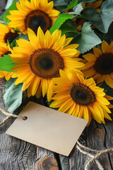 Close up of sunflowers with empty mockup label, on rustic wooden table background