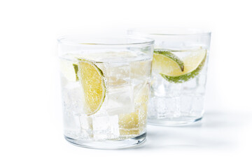 Glass of vodka tonic cocktail isolated on white background