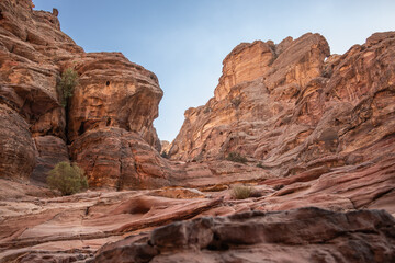 Fototapeta premium Stone Texture of a Sandstone Cliff in Jordan. Beautiful Rock on Ad Deir Trail in Petra during Daytime.