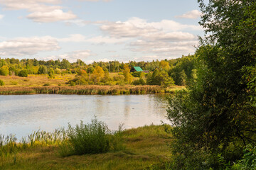 Izborsk, Russia, September 7, 2023. Small lake on a sunny autumn day.