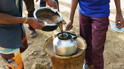 Coffee bottling the african way - African kilimanjaro tanzania coffee