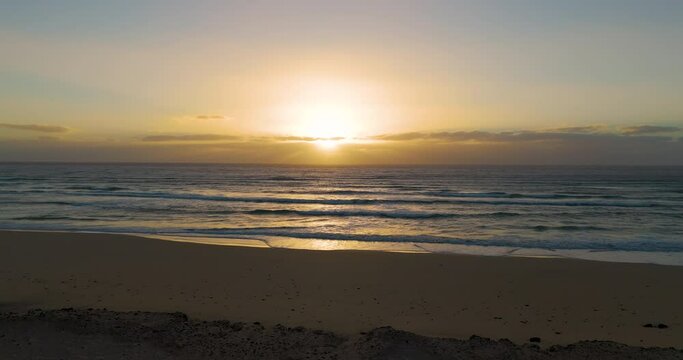 Beautiful sunset on the beach of the atlantic ocean