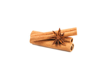 Cinnamon sticks and anise isolated on white background. Cinnamon roll and star anise. Spicy spice for baking, desserts and drinks. Fragrant ground cinnamon.