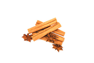 Cinnamon sticks and anise isolated on white background. Cinnamon roll and star anise. Spicy spice for baking, desserts and drinks. Fragrant ground cinnamon.