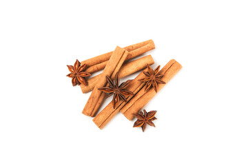 Cinnamon sticks and anise isolated on white background. Cinnamon roll and star anise. Spicy spice for baking, desserts and drinks. Fragrant ground cinnamon.