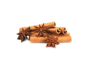Cinnamon sticks and anise isolated on white background. Cinnamon roll and star anise. Spicy spice for baking, desserts and drinks. Fragrant ground cinnamon.