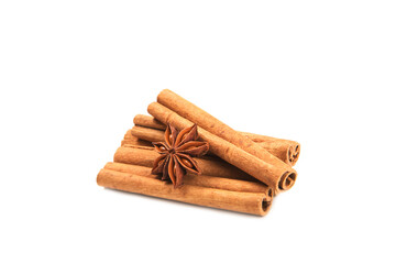 Cinnamon sticks and anise isolated on white background. Cinnamon roll and star anise. Spicy spice for baking, desserts and drinks. Fragrant ground cinnamon.