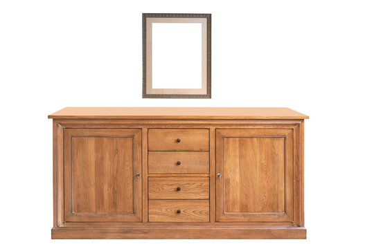 Empty blank frame on patterned wall and wooden dresser on hardwood floor
