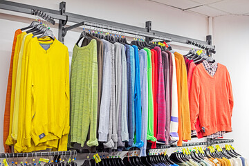 stylish modern men's raglans and sweaters in the supermarket