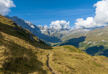 Fototapeta premium Breuil-Cervinia (Italy) - A view of Cervino mountain range of Alps in Valle d'Aosta region, here with trekking paths, alpin lakes ed alpinistic Ferrata Vofrède.