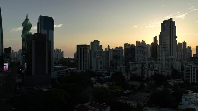 Drone view of Panama City skyline with sky in the background at sunset in Central America