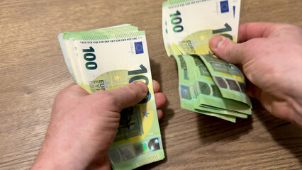 EURO coins notes count. EURO Money cash in hand. EURO Money Banknotes for pay. EURO bills and coins in Crisis of European Union. Counting the saved Coins bills for pension. Hands counting money.