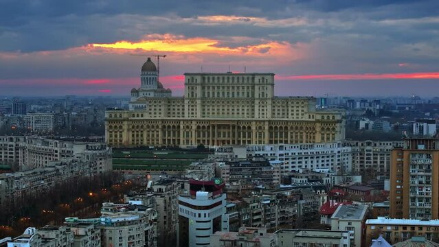 Aerial drone view of Palace of the Parliament in Bucharest downtown at sunset. Romania