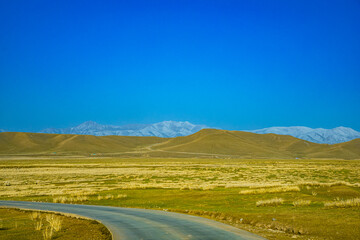 Aba Qiang and Tibetan Autonomous Prefecture, Sichuan Province - mountains and grassland scenery under the blue sky