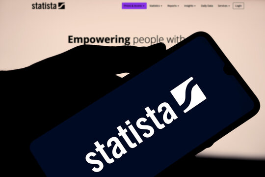 Dhaka, Bangladesh- 20 March 2024: Statista.com logo is displayed on smartphone.