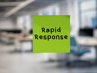 Post note on glass with 'Rapid Response'.