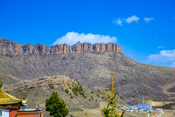 Aba Qiang and Tibetan Autonomous Prefecture, Sichuan Province - mountains and grassland scenery under the blue sky