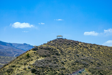 Aba Qiang and Tibetan Autonomous Prefecture, Sichuan Province - mountains and grassland scenery under the blue sky