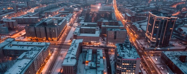 top view of city streets and buildings at night - obrazy, fototapety, plakaty