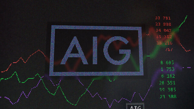AIG close up on logo of American International Group on the screen of an exchange. American International Group price stocks, $AIG on a device, New York City, New York.