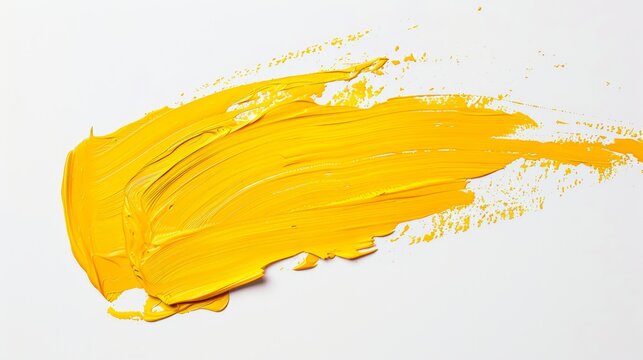 Smear of yellow paint on white background