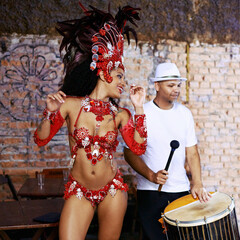 Women, samba dancer and carnival with smile, stage and band with fashion, culture or creativity in...