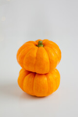 Beautiful little pumpkins. Autumn fall season concept. Minimal composition. Copy Space