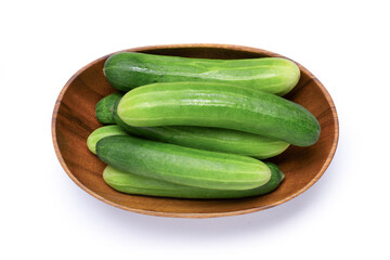 Cucumber in bowl on white