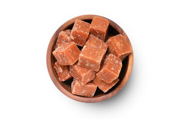 Brown sugar cane cube in bowl on white