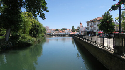 Fototapeta premium View of Rio Nabão: The Nabão river is a Portuguese tributary of the Zêzere river that passes through the city of Tomar. It rises in the municipality of Ansião, in Olhos de Água