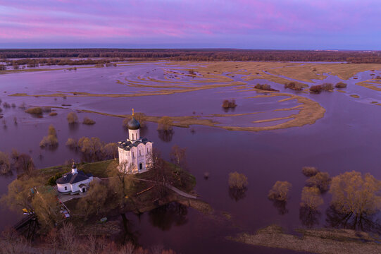 Aerial view of flooded Nerl river with Church of the Intercession on the Nerl, Bogolyubovskoe, Russia.