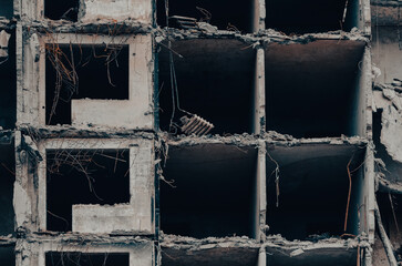 destroyed and burned houses in the city during the war in Ukraine