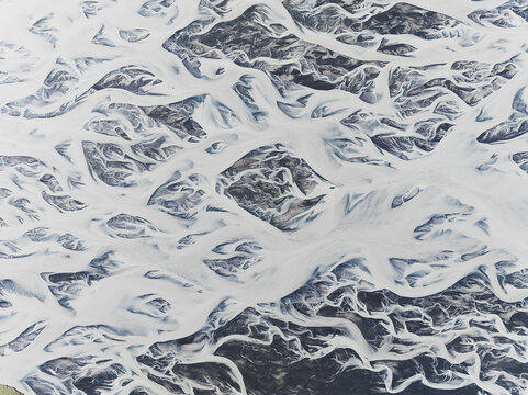 Aerial view of abstract ice rivers in Iceland.