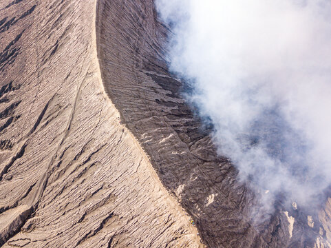 Aerial view of active volcano ridge Bromo in Sukapura, Jawa Timur, Indonesia.