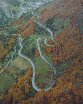 Aerial view of zigzagging road through the beautiful mountain pass in Asturias, Spain.