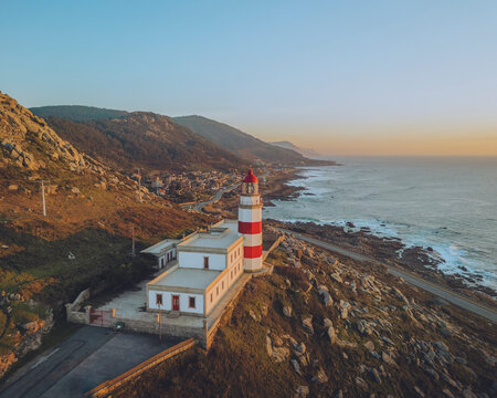 Aerial view of Faro de Cabo Silleiro and coastal lighthouse at dawn, A Guarda and Baiona, Galicia, Rias Baixas, Spain.