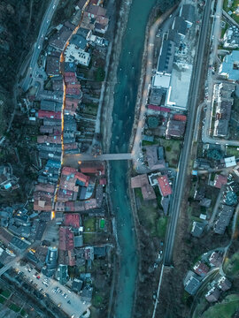 Aerial view of Klausen cityscape with river and roads, South Tyrol, Italy.