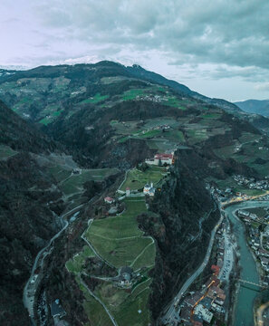 Aerial view of Klausen town and Sabiona Monastery, South Tyrol, Italy.