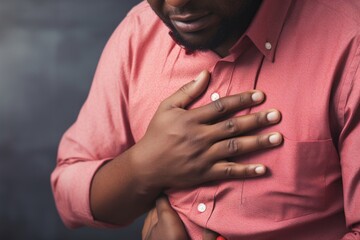 the discomfort of a man suffering from heartburn