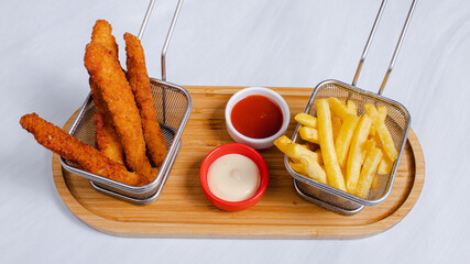 Fries basket and fried chicken strips