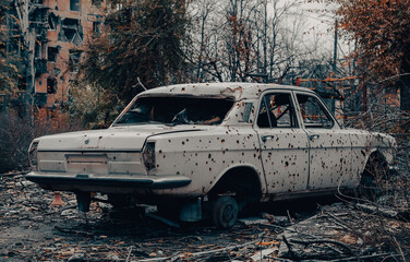 damaged and looted cars in a city in Ukraine during the war