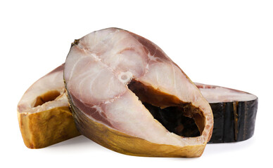 Pieces of smoked fish close-up on a white background.