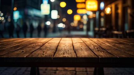 Long wooden table sits in alley at night with street lights illuminating the area. - obrazy, fototapety, plakaty