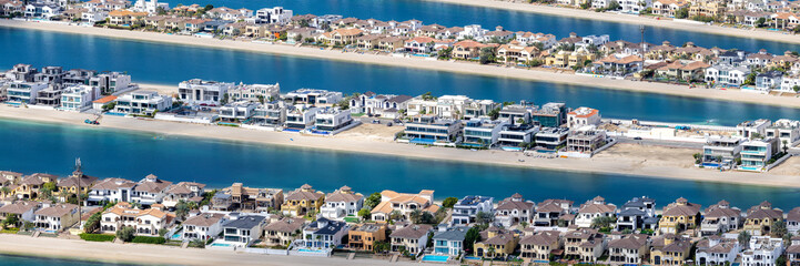Dubai The Palm Jumeirah artificial island with beach luxury villas real estate panorama