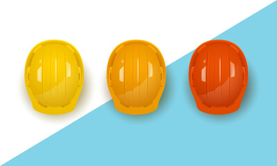 Set of three realistic construction helmets in different colors. Vector illustration.