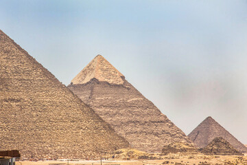 Fototapeta na wymiar Archeology photography, Great Pyramid of Giza, Cheops Pyramid, Photo is selective focus with shallow depth of field. Taken Cairo Egypt on 17 June 2019