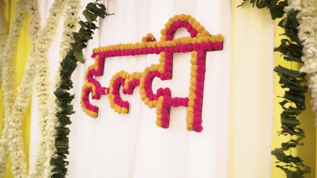 Cinematic Side View of  Haldi Ceremony Decoration, Hindu Wedding Decoration of Haldi Stage, Indian Wedding Colorful Background