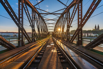 Fototapeta na wymiar On the rails of the Vysehrad railway bridge over Vltava river.