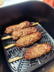minced meat on wooden toothpicks, Greek souvlaki, meat baked in airfryer, minced meat